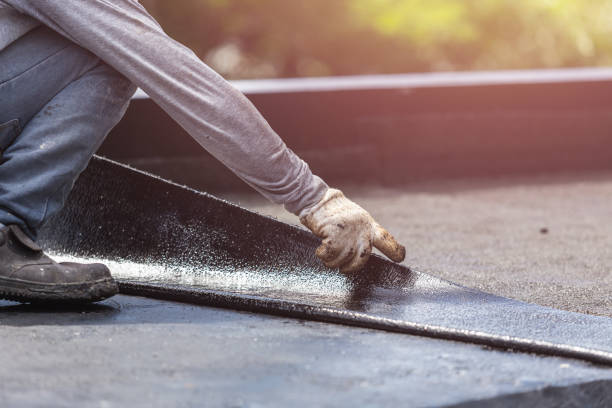 Professional Basement Waterproofing technician working in Oakley, KS